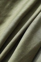 asimetrik kesim yırtmaçlı düğme detaylı etek